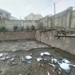 اجرای سنگ لاشه کف حیاط محوطه سازی چکشی محمدی